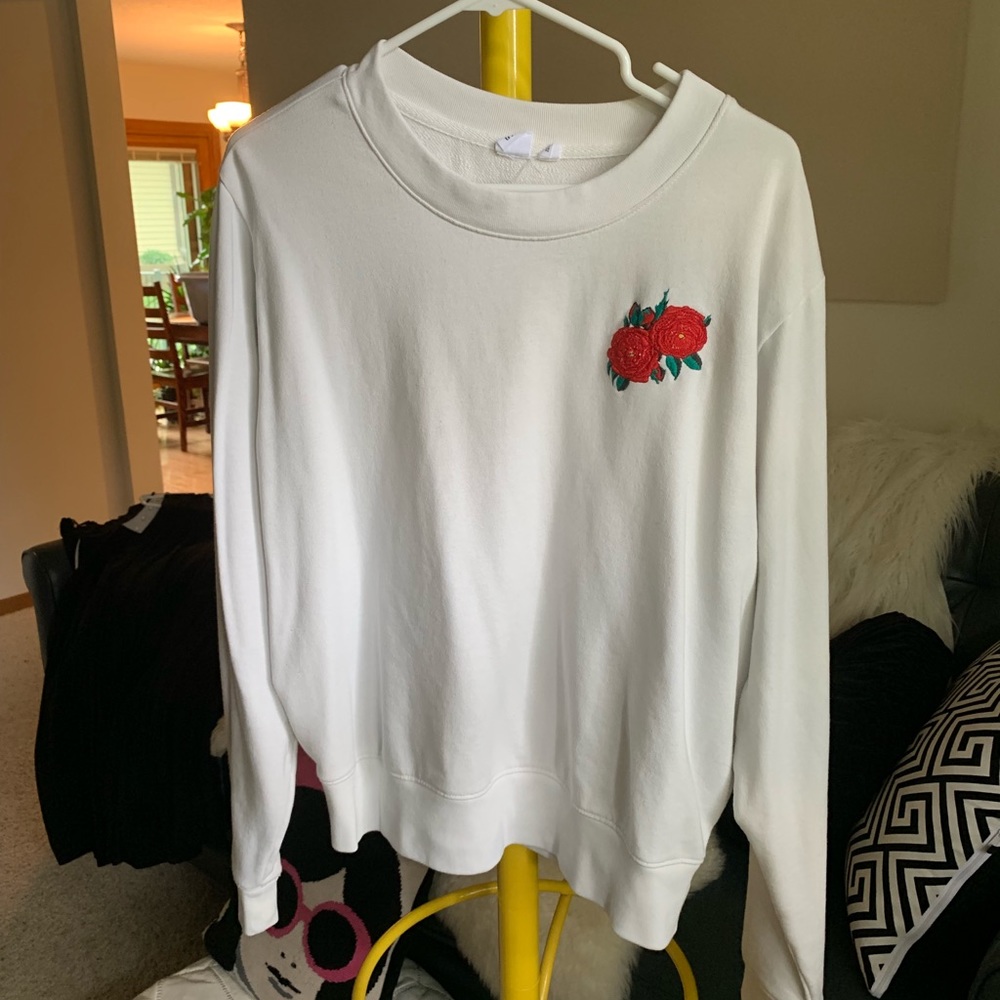 Sweatshirt with embroidered rose